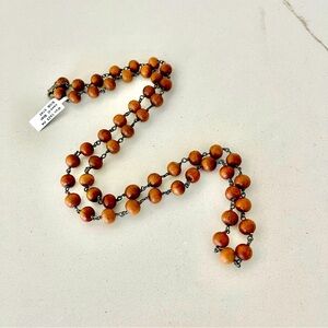 Unisex One of a kind Sandlewood Bead necklace 28” in length.